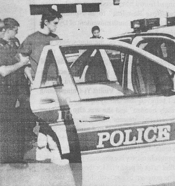 IPD leads flashing suspect off UHS campus in 1997 (Courtesy of Mr. Chinn) 