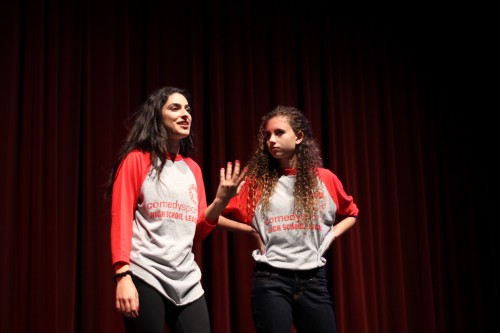 Alumna Layla Bina (2014) performs as a part of the red team.