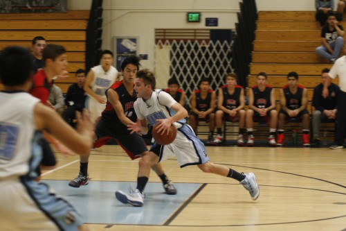 Boys basketball defeated by Beckman 85-92, struggles offensively in overtime