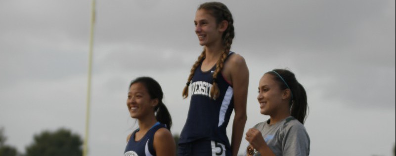 Paige+Metayer+%28Fr.%29+and+Carmel+Lee+%28Jr.%29+placed+first+and+second+in+the+400m.+Both+runners+qualified+for+CIF.+%28Zoe+Berger%29