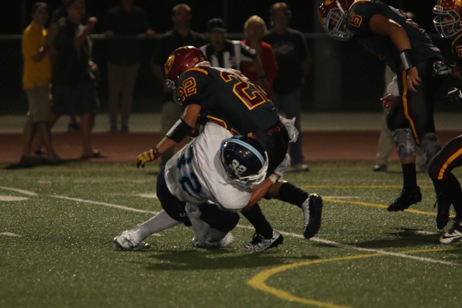 #32 Brandon Mattson set the tone for the defense, with countless crushing hits and tackles. (Martin Chinn)
