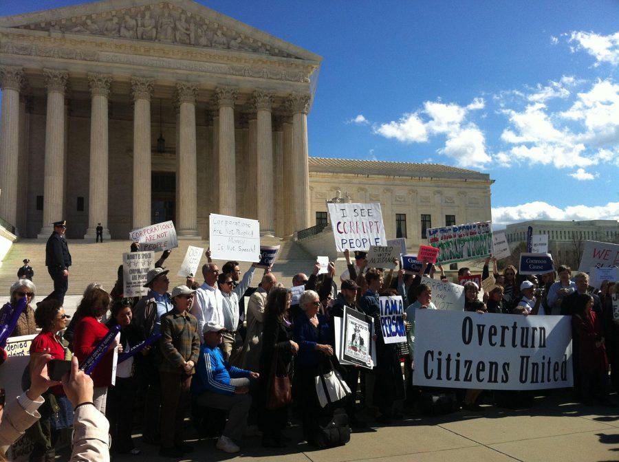 Protesters outside the Supreme Court in 2012 rally against the courts decision in Citizens United, one of two rulings that has helped boost the influence of so-called dark money groups in elections. (Photo by Jordan Krueger via flickr/Creative Commons/Cronkite News Service/TNS)