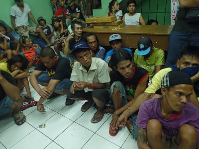 65 alleged drugs users were arrested on August 31, 2016 in Culiat, a notorious drug den in Quezon City, Philippines. Of the 65 users, 9 were caught smoking shabu, aka methamphetamine, and 5 were minors. (Sherbien Dacalanio/Pacific Press/Sipa USA/TNS)