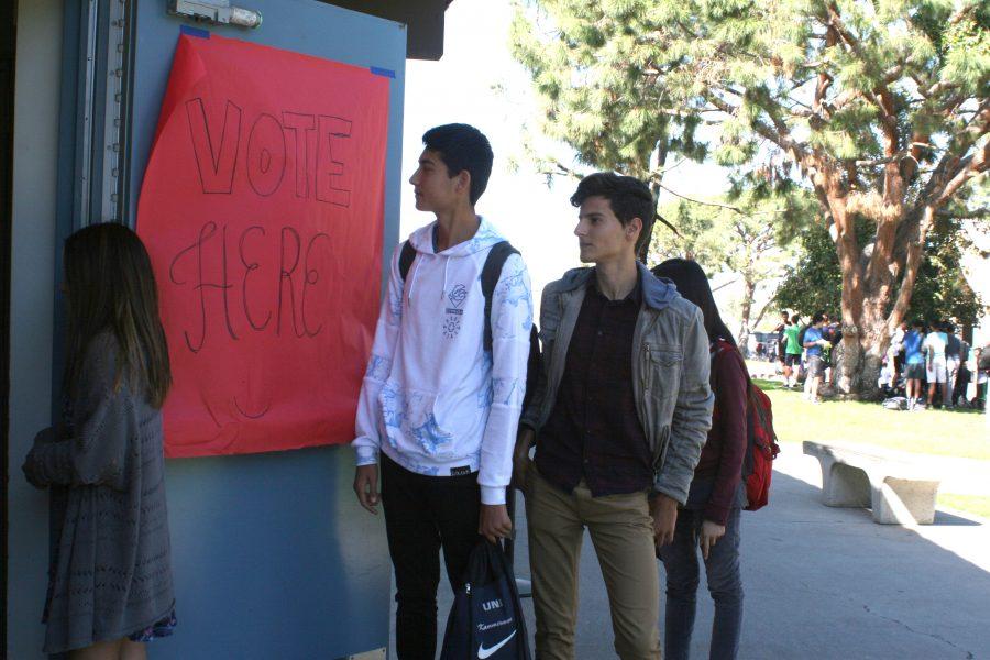 Students wait in a line to enter the Model Election polling station in the MPR. (Amanda Tran)