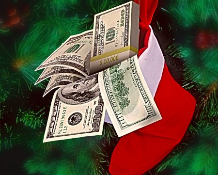 300 dpi Rick Nease illustration of a Christmas stocking holding $100 bills; for use with stories about giving money as a holiday gift. (The Detroit Free Press/MCT)