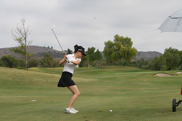 Senior captain Emy Zhu taking her back swing, ready to hit the ball. (X. Huang)