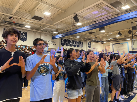 UHS students hold the UHS hand symbol during first pep rally of the school year.