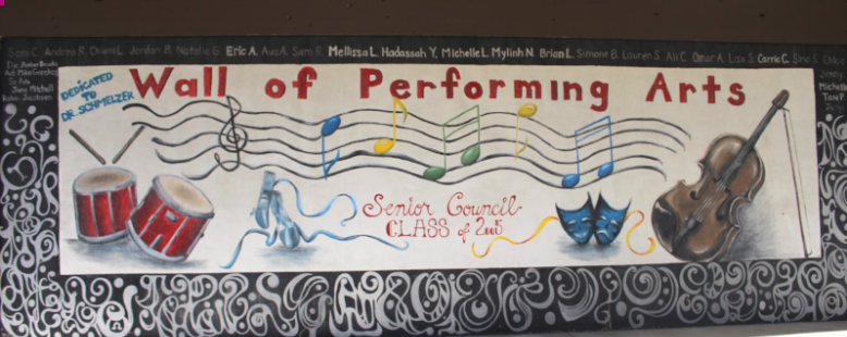 On the outside of the choir room, the class of 2005 Senior council recognizes the performing arts of University High School. Photo by Yazmin Tinoco.