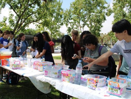 UHS students participate in making tie-dye shirts and bandanas on Better Together Day. 