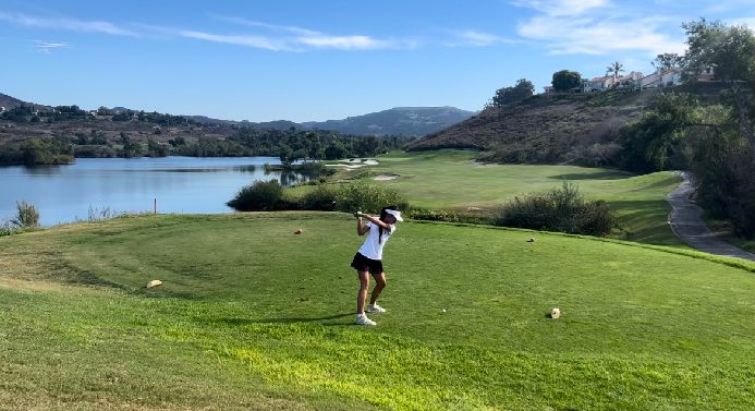 Chloe Lin practicing her swing at Strawberry Farms. She was looking to get a win for her senior night.