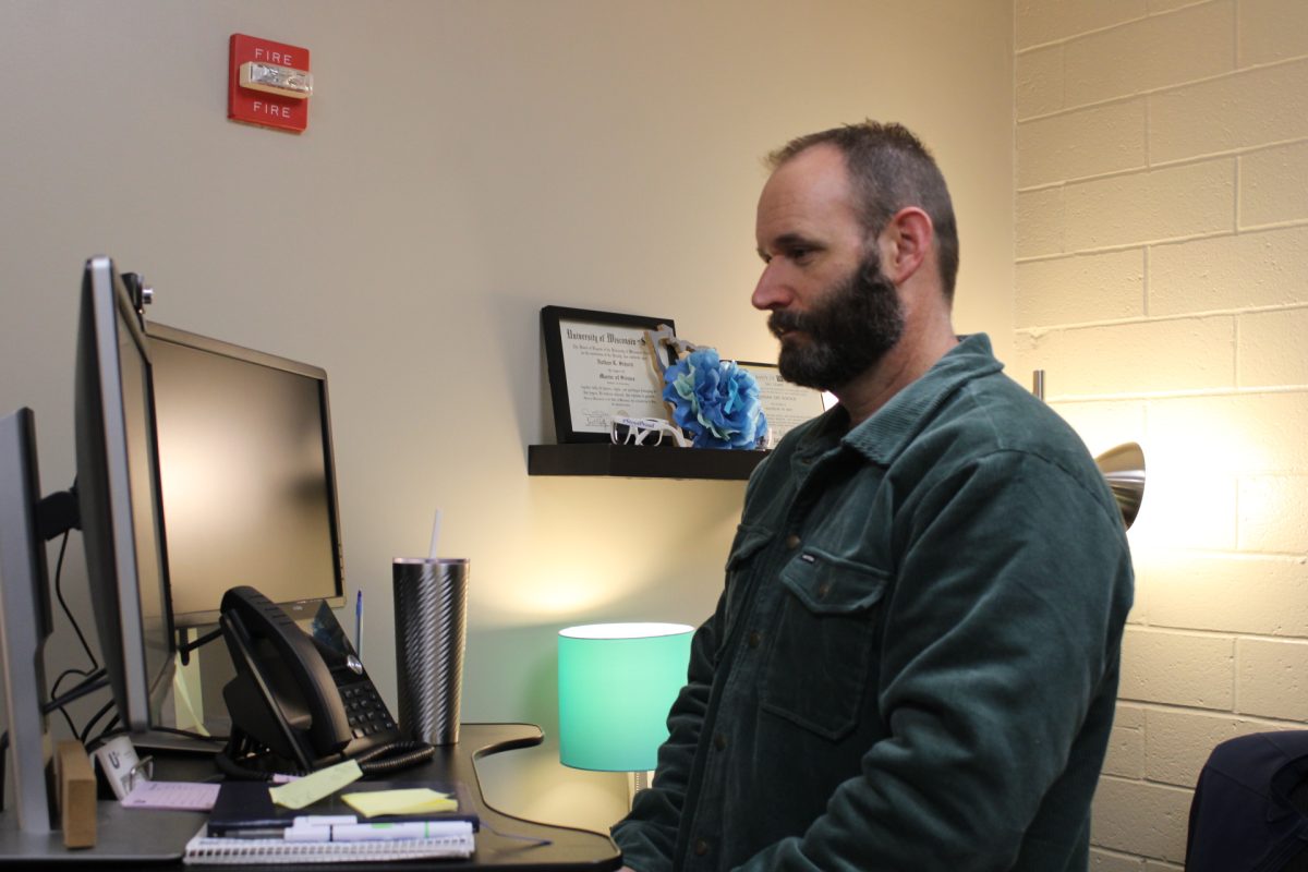 Nate Schoch, a UHS counselors, works in his office. 