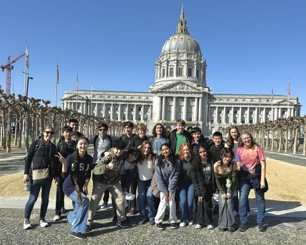 UHS MUN students pose in front of San Francisco City Hall with their advisor, history teacher Mrs. Oakes.