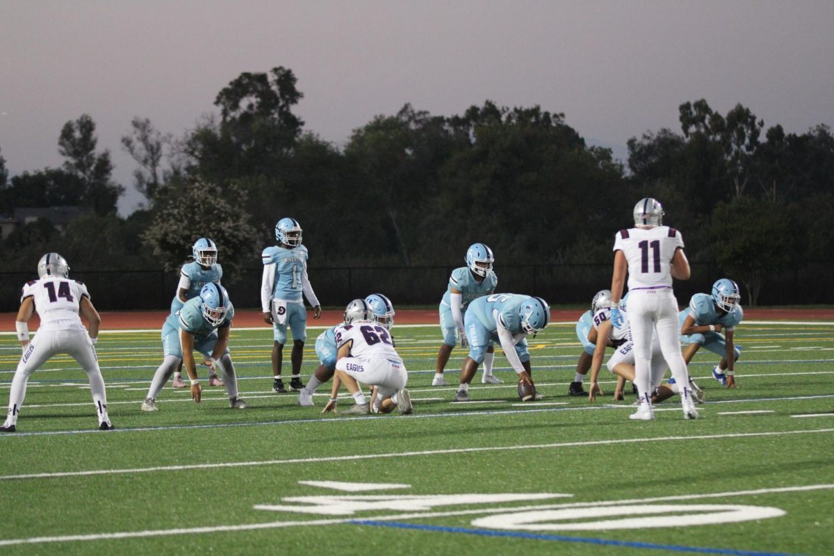 UHS prepares to snap the ball to start a touchdown attempt.