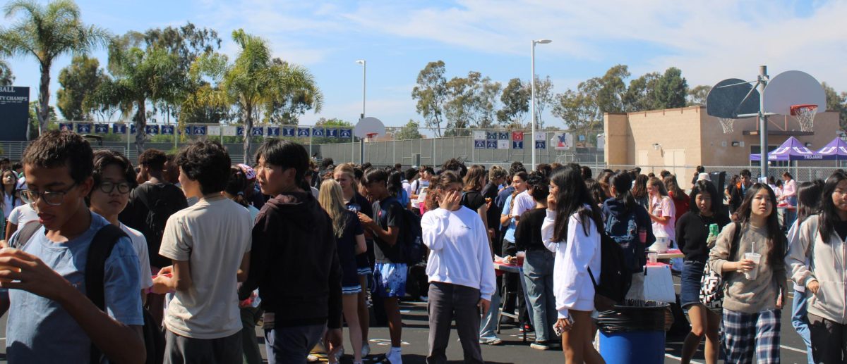 Trojans rally on the blacktop in support of  UHS' clubs.