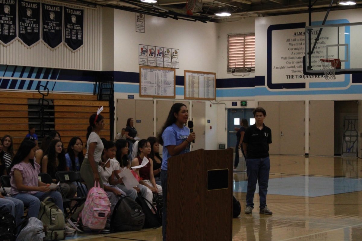 A candidate for Freshman Student Council gives a speech to students in the UHS Gym on Sept. 5