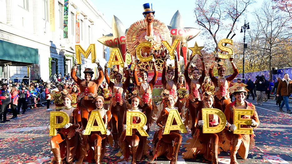 The crowd enjoys the Macy's Thanksgiving Day Parade each year in New York City. More spectators enjoy the parade from the comfort of their own home.