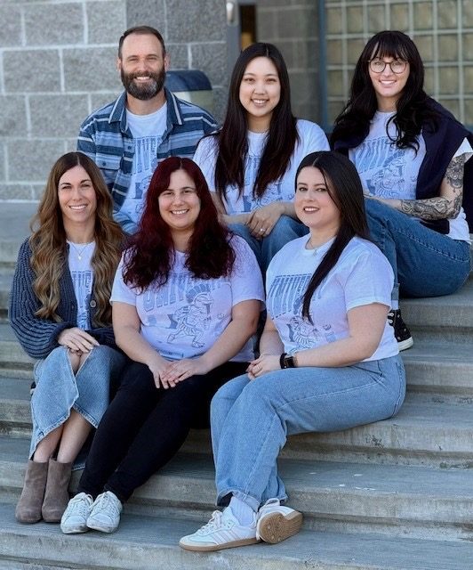 The UHS Counseling Department sits on the steps of the Big Theater. National Counseling Week took place from Feb. 2-6 and celebrated the counselors for the work that they complete throughout the year.